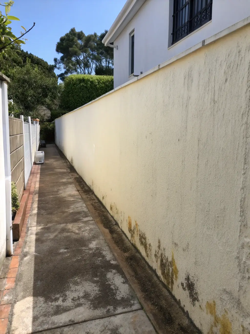 A before-and-after shot showing a wall treated with PYROCHILL BEVARA, highlighting its smooth finish, vibrant color, and overall aesthetic appeal, emphasizing its dual functionality of protection and beauty.